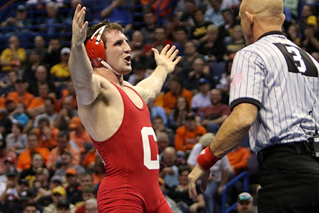 NCAA champion Gabe Dean with hands raised